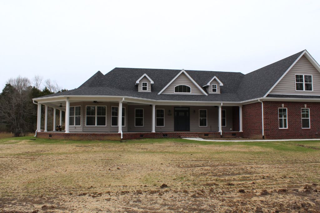 Custom Home Exterior (Hardie + Brick + Porch)